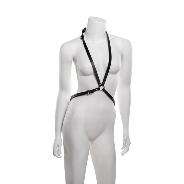 Mannequin wearing a black harness on a white background