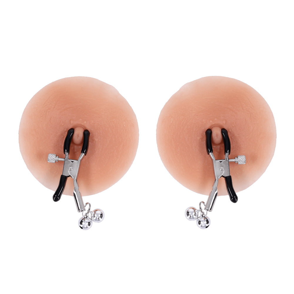 Two silicone breast forms with clamp attachments on a white background
