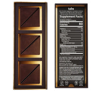 tabs Chocolate packaging with gold accents and supplement facts label on a white background