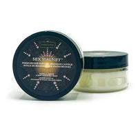 Sex Magnet massage candle vanilla amber with black lid on a white background
