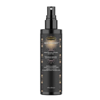 Black bottle of 'Sex Magnet' pheromone-infused body oil vanilla amber on a white background