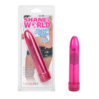a sleek glittery pink vibrator that is transparent enough to see the internal motor, shown next to its plastic packaging