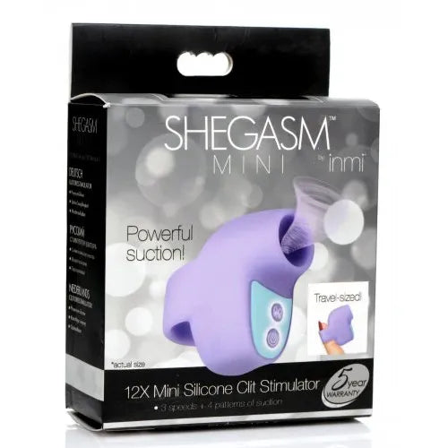 SheGasm Mini clitoral stimulator product packaging with purple silicone stimulator on a gray background