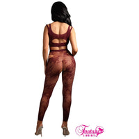 female wearing floral bodystocking with slit sided and chest back view