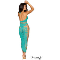 brunette female wearing Seamless net gown with an intricate knit design, strappy fixed elastic sides, a halter tie-neck neckline with open back and a fringe hem. back view