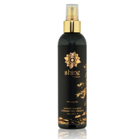 Black bottle with gold cap and shine natural toy cleaner sliquid branding on a white background