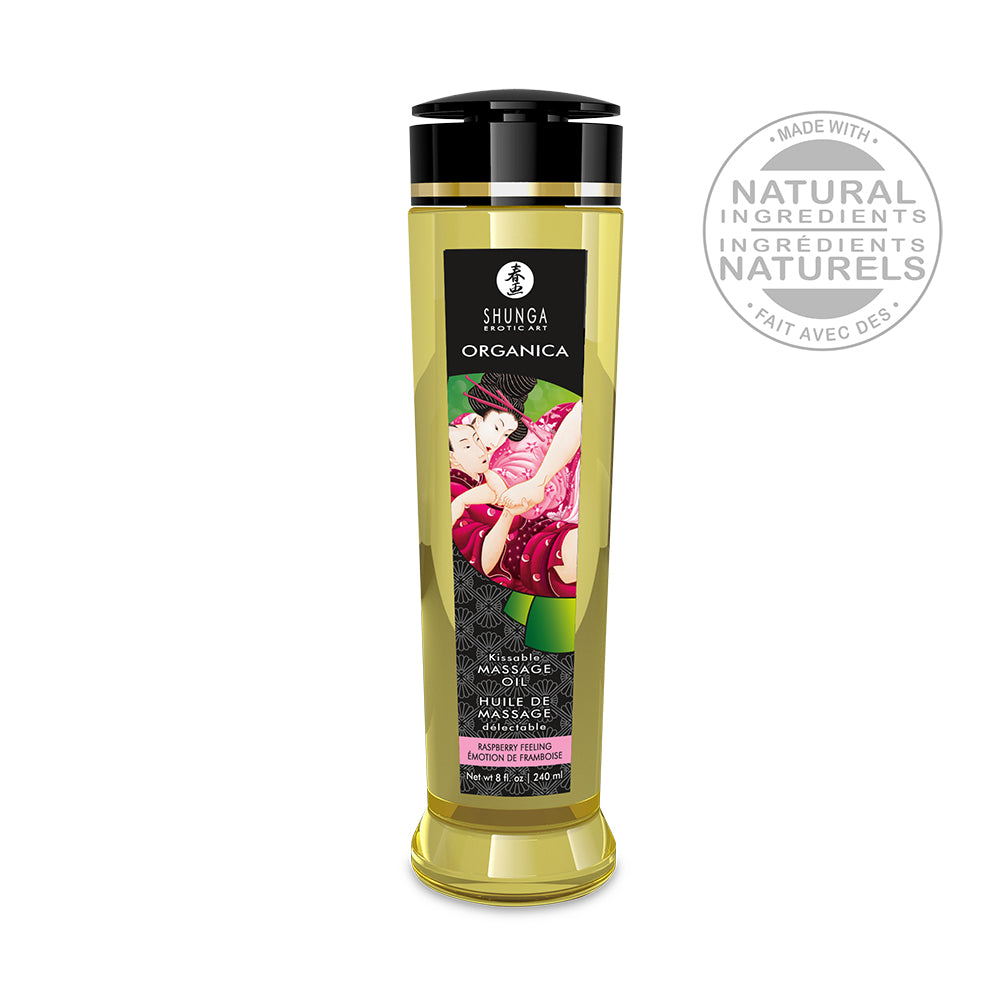 Shunga Organica massage oil bottle raspberry with a white background