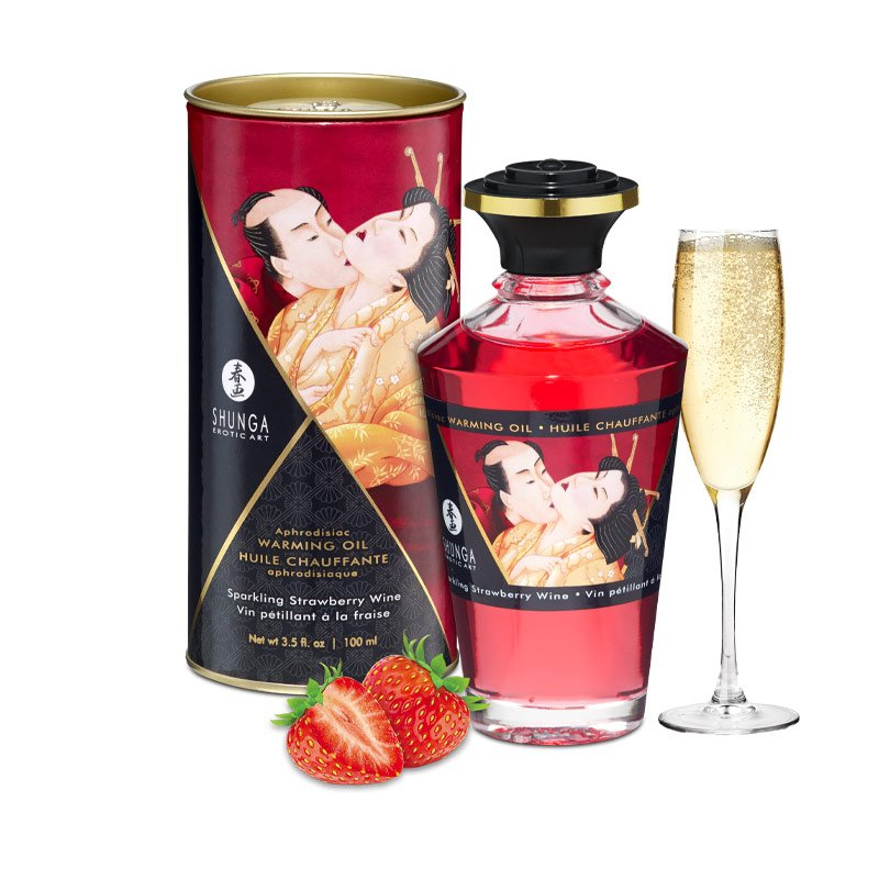 wine glass, strawberries, and warming massage oil bottle and package