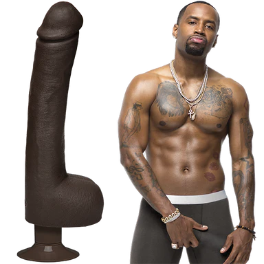 a large black realistic penis shaped dildo with balls and a vibrating suction cup base. Shown next to a black man wearing black underwear