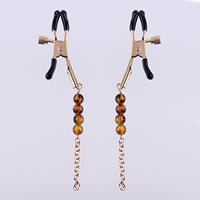 gold nipple clamps with amber beads and gold chain