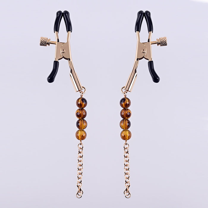gold nipple clamps with amber beads and gold chain