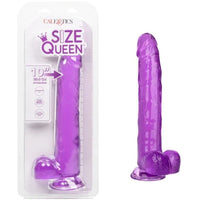 a purple detailed penis shaped dildo with balls and a suction cup, shown next to its plastic packaging