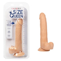 a beige detailed penis shaped dildo with balls and a suction cup, shown next to its plastic packaging