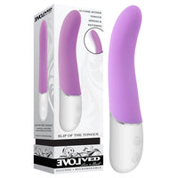 purple tongue shaped vibrator with white handle beside box