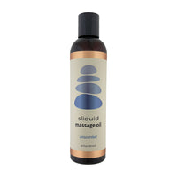 Bottle of sliquid unscented massage oil with a beige label and black cap on a white background
