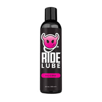 Ride Lube bottle with black and pink design on a white background
