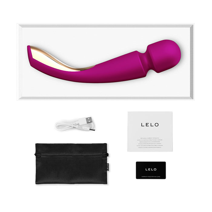 pink curved massager with head and gold plating on handle with charger & storage bag