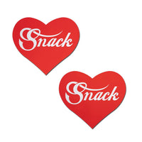 red heart pasties with the word snack written in white