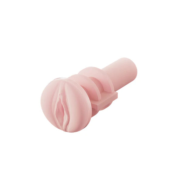 Pink silicone vagina insert on a white background
