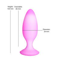 Pink softies anal plug with measurements on a white background