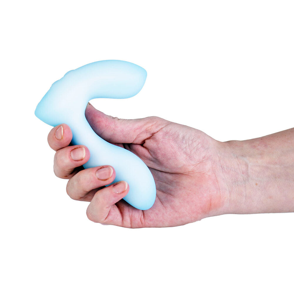 Hand holding a blue softies silicone vibrator tool against a white background
