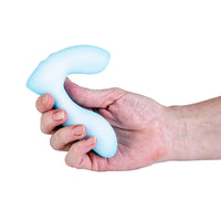 Hand holding a blue softies silicone vibrator tool against a white background