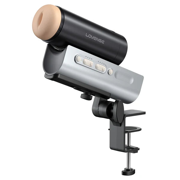 beige tube insert, with black case, on grey metal mount stand