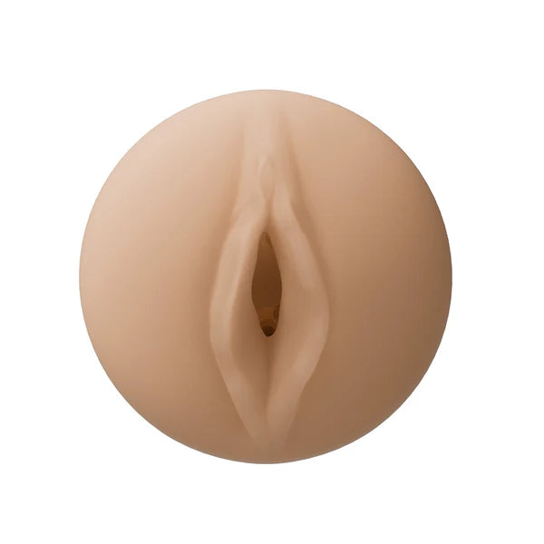 Beige silicone vagina on a white background