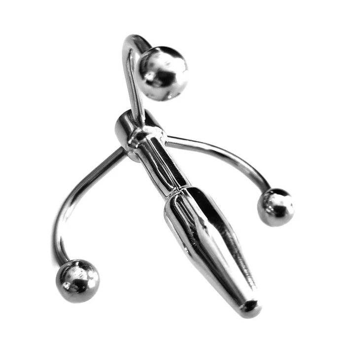 Metallic crown penis plug with 3 spherical balls  on a white background