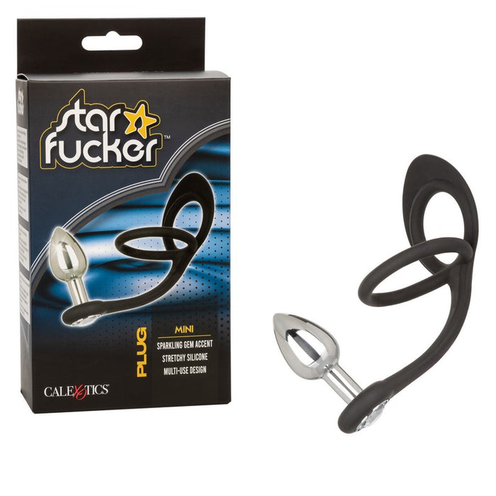 black silicone cockring with ball sling with mini plug attachment next to star fucker box
