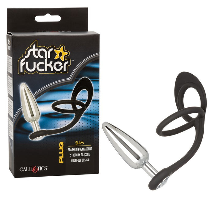 black silicone cockring with ball sling with slim plug attachment next to star fucker box