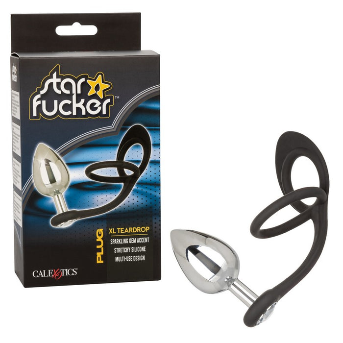 black silicone cockring with ball sling with xl teardrop plug attachment next to star fucker box