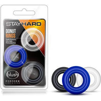 3 colored cock rings next to stayhard package