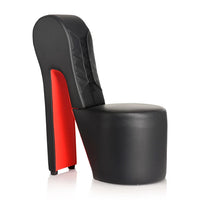 Black high-heeled shoe chair with red sole on a white background