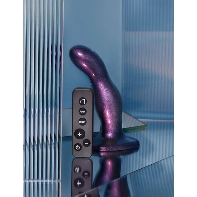purple curved vibrating dildo sitting on floor