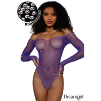Model wearing a purple rhinestone bodysuit with 'Dreamgirl' branding.