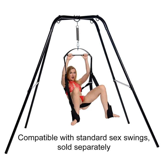 extreme sex sling stand and swing being used by a woman
