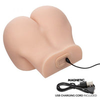 twerking vibrating vagina and butt masturbator  with USB charging cord on a white background