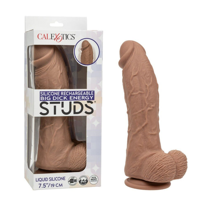 Silicone rechargeable dildo with packaging labeled 'CALEXOTICS STUDS' on a white background.