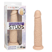 Silicone vibrating & thrusting vibrator with packaging labeled 'Calexotics' on a white background
