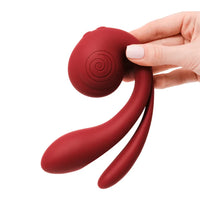 snail shape vibrator held in hand