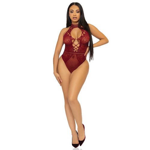 Woman wearing a red lace bodysuit on a white background