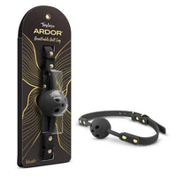 Temptasia Ardor Breathable Ball Gag by Blush in black silicone with adjustable strap and ventilated gag design, shown alongside retail packaging and angled product view.