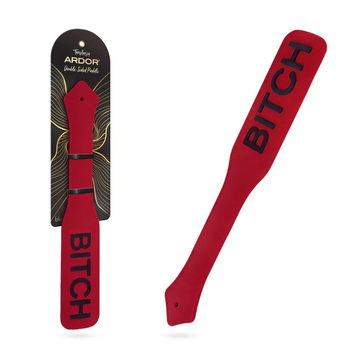 Temptasia Ardor Double-Sided Paddle by Blush in red silicone with bold “BITCH” lettering, shown alongside retail packaging and angled product view.