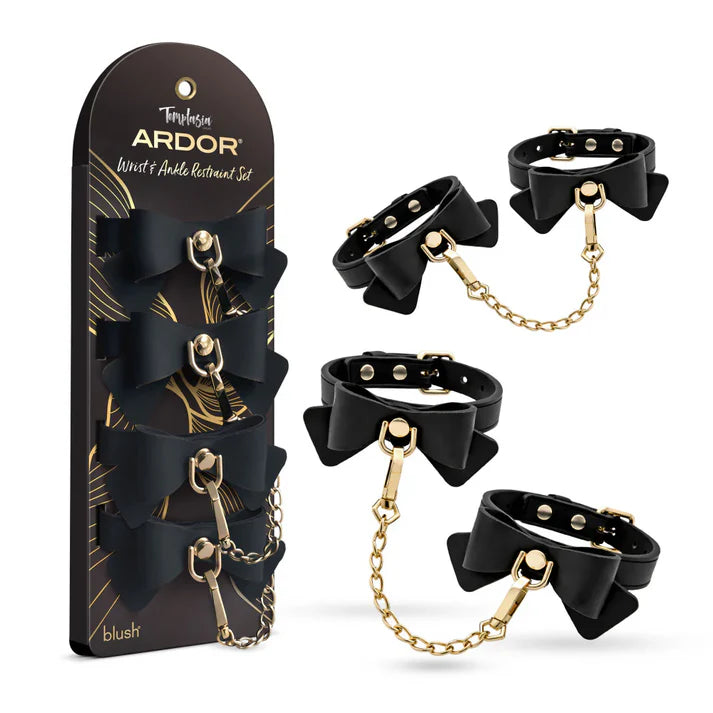 Temptasia Ardor Bow Wrist and Ankle Restraint Set by Blush featuring adjustable black cuffs with decorative bows and gold-tone chain connectors, shown alongside retail packaging.