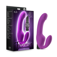 strapless strap on with single bulb insert beside box in purple