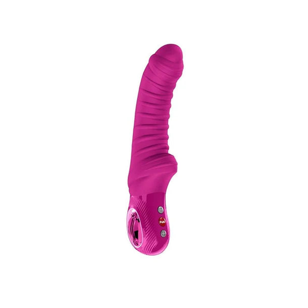 Pink ribbed vibrator on a white background