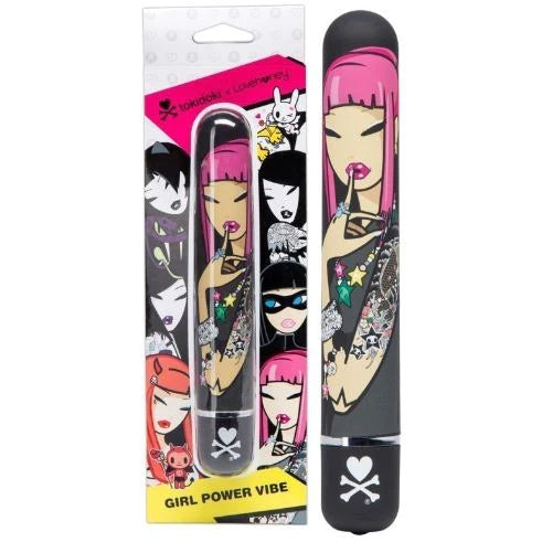 a black smooth vibrator with a picture of a cartoon girl with pink hair and tattoos, shown next to its display box with several cartoon ladies on it