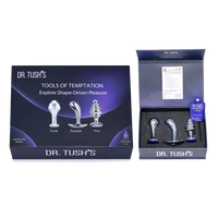 Dr. Tush’s Tools of Temptation Collection featuring three metal anal plugs in Knob, Prostate and Hive shapes, presented in premium display packaging.