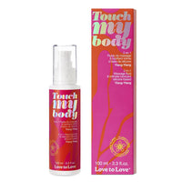 white bottle with pink wrapper. lubricant & massage ylang ylang. beside box packaging 